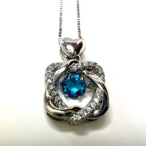 Silver flower with Blue crystal Necklace
